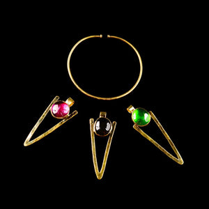 Eye Catching Brass choker with exchangeable vibrant colored pendants; that illuminate happiness. It is the perfect piece to bringing sunshine to your soul.